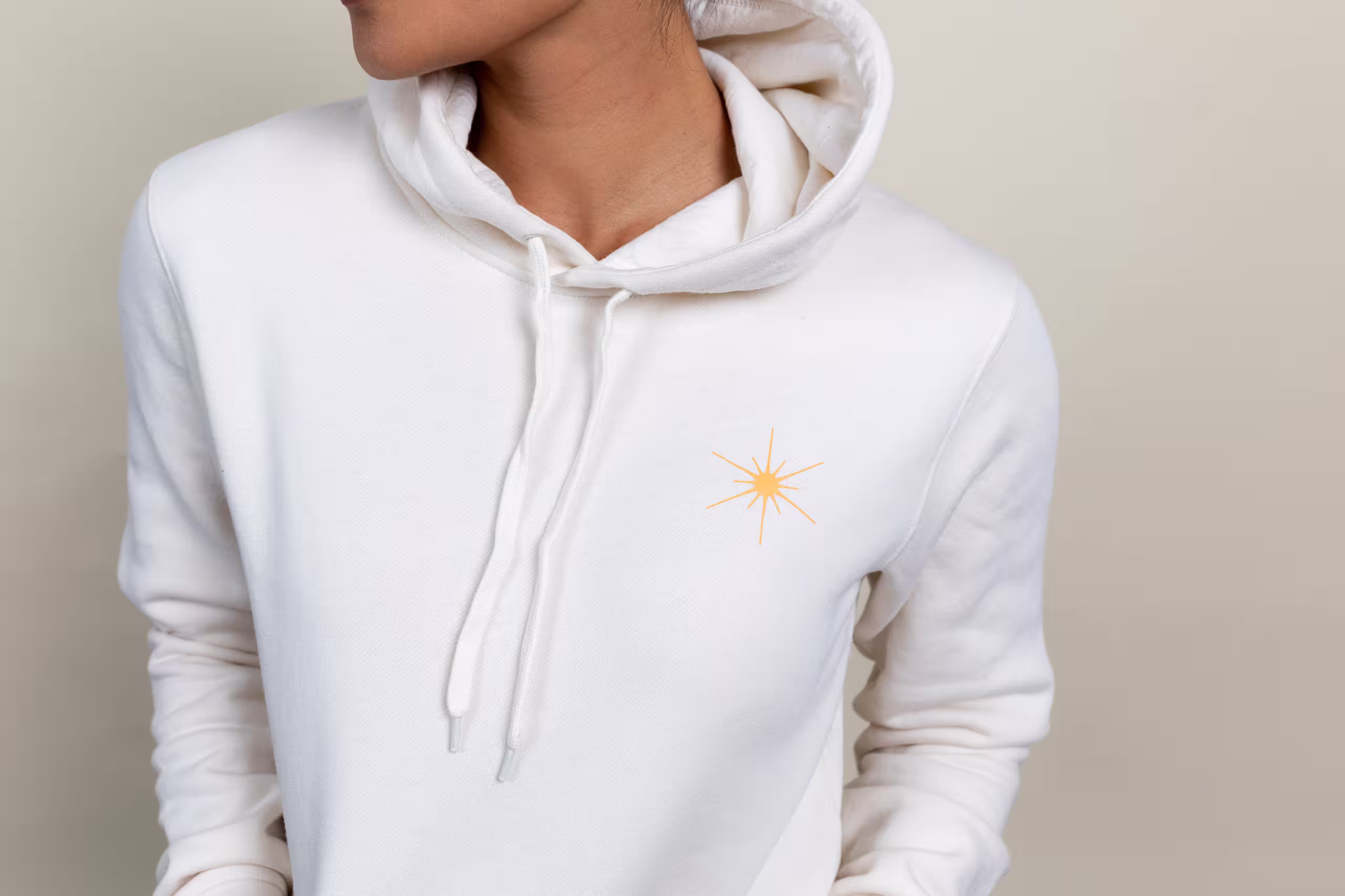 someone wearing a white hoodie