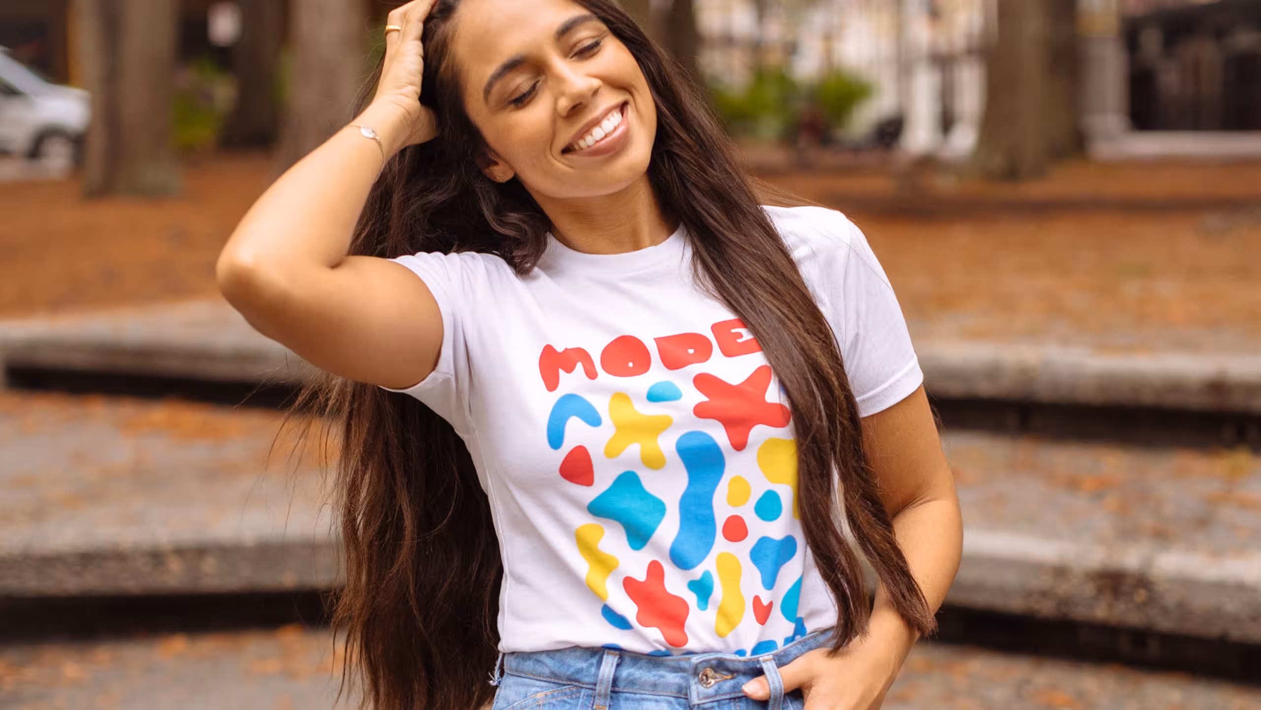 women wearing a white shirt with a geometric-like design