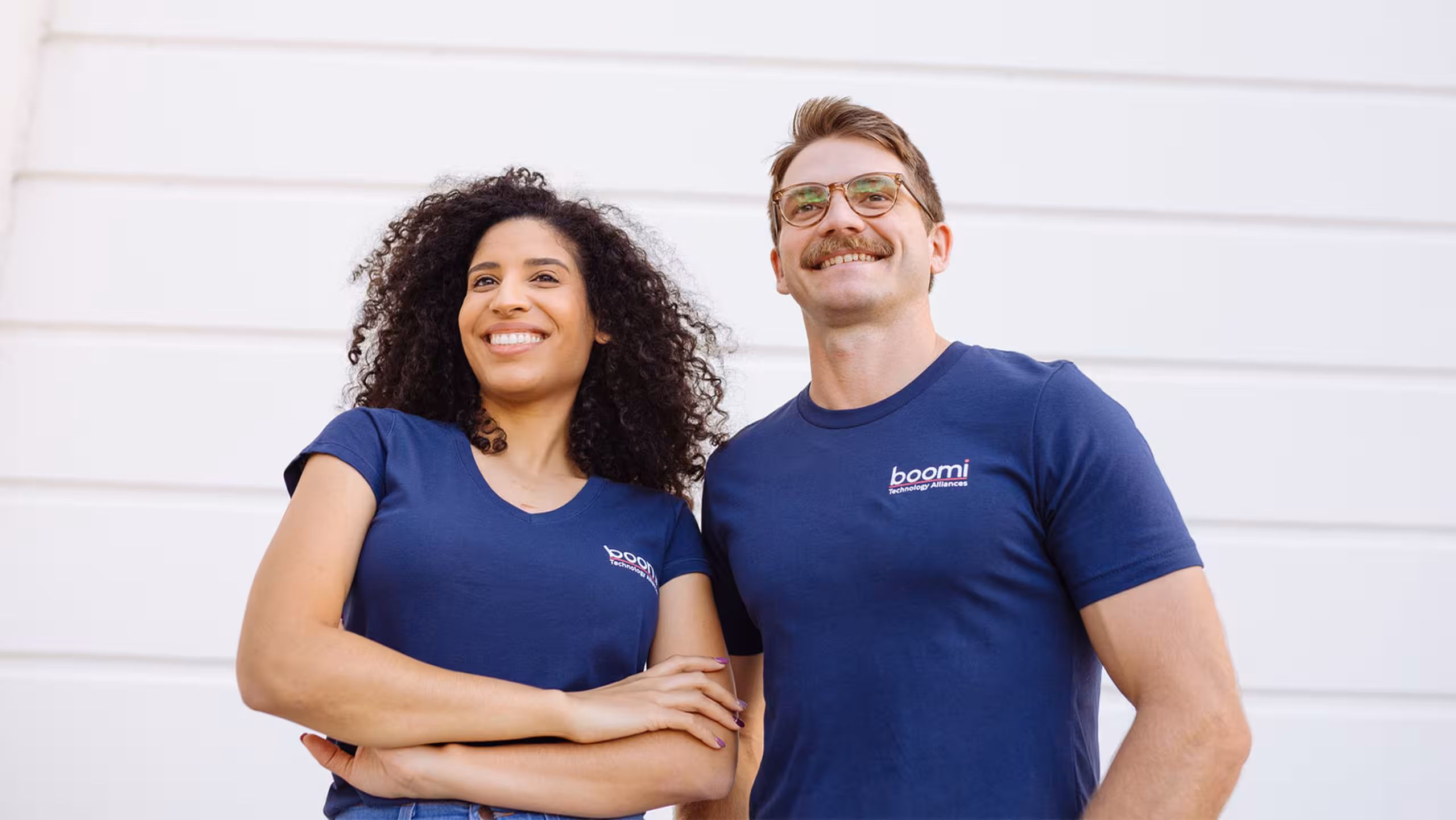 man and women wearing a navy t-shirt